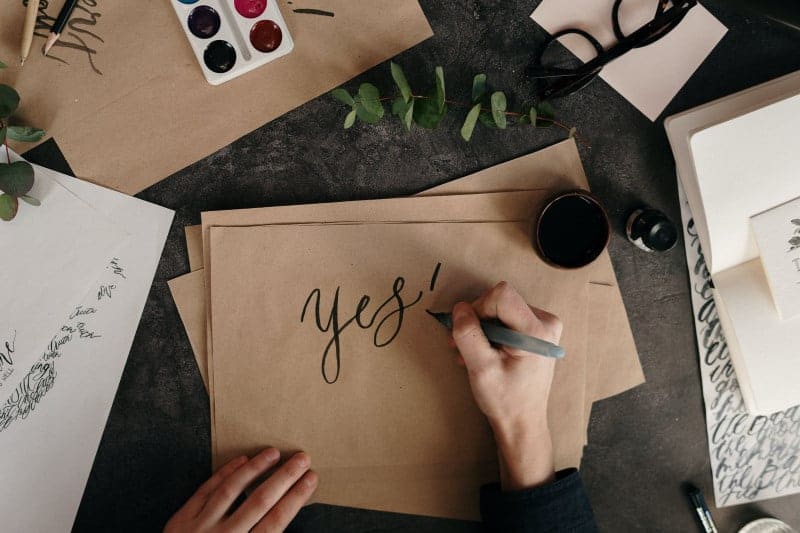"Yes" inked onto a fancy brown envelope
